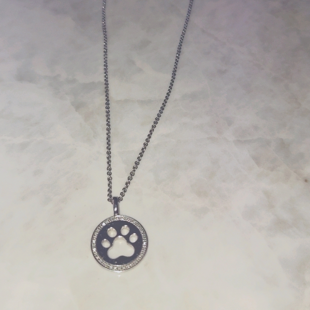 Sterling silver paw print with diamonds
